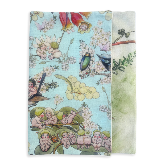 Reversible and washable spare bed cover dog cat and pet bed cover showing May Gibbs gumnut babies design in earthy tones and sky blue bushland creates