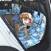 An Australian bulldog on a water-resistant hammock back seat cover with a Byron Bay surf design in blue. 
