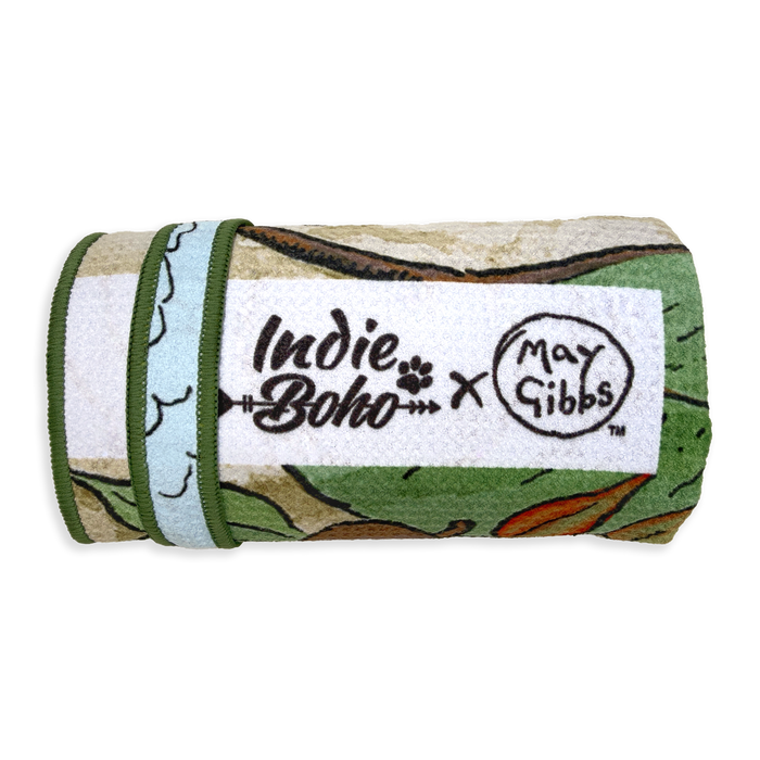 Rolled up May Gibbs pet travel and bath large towel